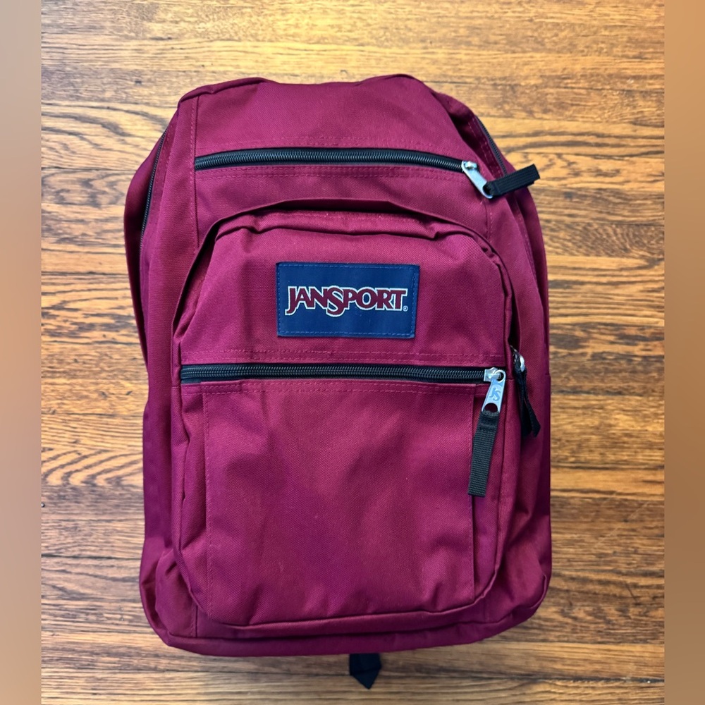 JANSPORT Burgundy and Backpack. Like new inside and out! Utilized Once (1 time)